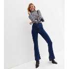 Blue Mid Rise Flared Brooke Jeans