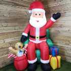 Premier 2.4M Indoor And Outdoor Inflatable Lit Santa in Chair With Presents