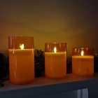 Set of 3 Warm White Battery Operated Christmas Wax Candles with Timer in Peach Glass