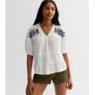White Textured Embroidered Tiered Top