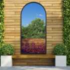 The Arcus Black Metal Framed Arched Leaner Garden Mirror